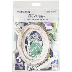 Könnte beinhalten: Eine Packung mit 73 ausgestanzten Ephemera-Bits in verschiedenen Farben und Designs. Die Packung enthält einen großen ovalen Rahmen, Tickets und andere dekorative Elemente. Die Packung ist mit "ARToptions VIKEN EPHEMERA BITS" beschriftet.