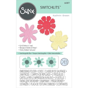 May include: Sizzix Switchlits die set featuring three flower shapes in pink, red, and yellow. The die set is labeled "Kathrin Breen" and includes the text "Cut & Emboss in 1 step!" and "Interchangeable Dies. Tampons Interchangables. Sellos Intercambiables."