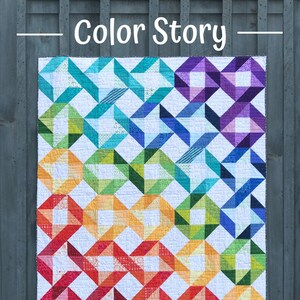 Puede incluir: Un patrón de colcha colorido llamado "Color Story" diseñado por Heather Valentine de The Sewing Loft. La colcha está hecha de una variedad de formas geométricas en un arcoíris de colores. La colcha mide 152,4 cm por 182,9 cm.