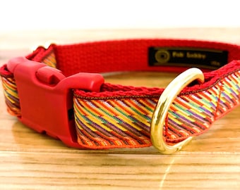 FIRE BOLT MULTICOLOR 1 " wide Dog collar. Bright diagonal fire bolts on red webbing. Red buckle. Gold metal hardware,style and sizes choices