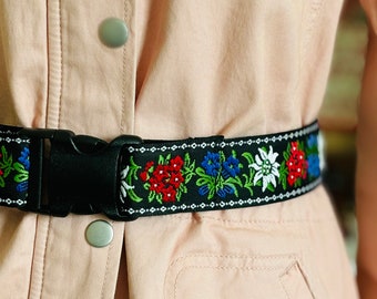 1.5" wide EDELWEISS ADJUSTABLE BELT. White edelweiss, blue, red flowers on black with black buckle. Tyrolean, Bavarian Alpen belt. Unisex