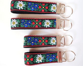 EDELWEISS Key Fob. Jacquard fob red, white, blue, green on Black webbing. Silver nickel hardware. Wristlet. 1" wide, Size choice