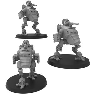 May include: Three grey plastic miniature models of walking robots with guns. Each robot is on a round black base.