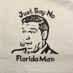 Just Say No to Florida Man T-Shirt: Sparkly Black Vinyl, Political Meme Gift