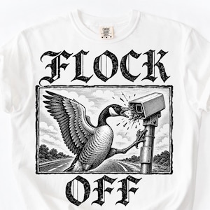 May include: A white t-shirt featuring a black and white graphic print of a goose attacking a security camera on a pole. The text FLOCK OFF is printed in a bold, gothic-style font above and below the rectangular illustration of the bird.