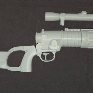 May include: A white plastic toy blaster with a scope. The blaster has a long barrel and a handle with a trigger.