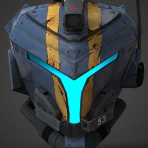 May include: A blue and yellow futuristic helmet with a glowing blue visor. The helmet has a rugged, metallic appearance with yellow stripes and the number "53" on the lower front. It features various attachments against a dark background.