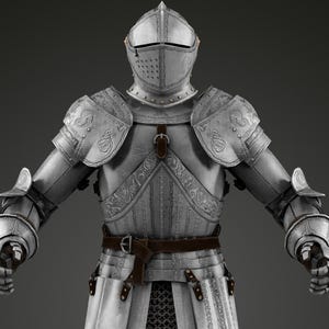 May include: A full suit of medieval armor in silver-gray metal. The armor includes a helmet, shoulder guards, chest plate, arm and leg protection, and gauntlets. A brown leather belt is worn around the waist. The armor is highly detailed with decorative patterns.