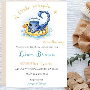 May include: Baby shower invitation featuring a blue scorpion in a sailor hat on a yellow duck float. The invitation includes the text "A little scorpio is on the way" and details for Liam Brown's baby shower.