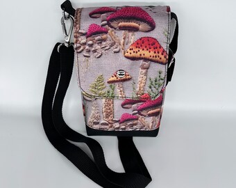 Mushroom cross body bag, small with adjustable strap, fully lined with wipeable fabric, Inside and outside pockets, Black poly thread.