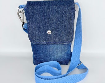 Denim cross body bag, fully lined with cotton fabric, Inside and outside pockets and 2 card slots, purple poly thread and adjustable strap