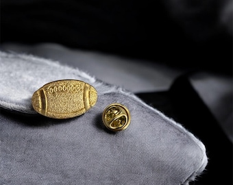 Gold Football Lapel Pin: Sports Fan Accessory