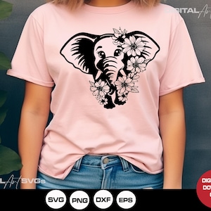 May include: A pink t-shirt featuring a black silhouette of an elephant with flowers around its head. The text "SVG PNG DXF EPS" is at the bottom of the image.