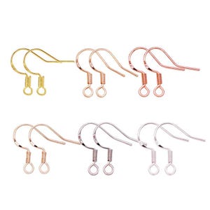 May include: A collection of earring hooks in various metallic finishes, including gold, rose gold, and silver. The hooks are displayed against a white background, showcasing their curved design and coiled bottom loops for attaching earrings.