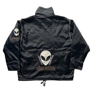 May include: Black puffer jacket with an alien logo and the text "alien nation long lasting rubber coated" on the back.