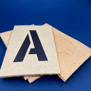 vintage cardboard letter number stencil set . 4 inch letter & numbers . unused