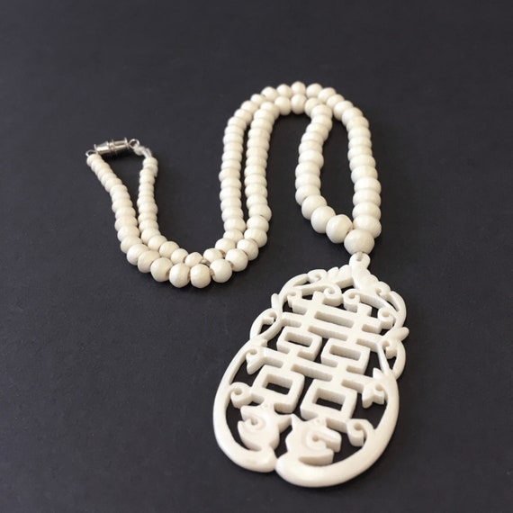 lovely carved look asian pendant necklace of grad… - image 1