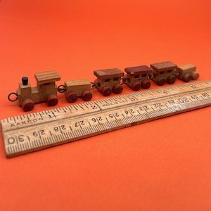 vintage wooden mini train set . 6 piece set with rotating wheels . natural wood miniature train . teeny tiny train