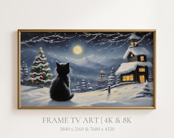 May include: A digital artwork in a gold frame depicting a black cat sitting in snow, looking at a moonlit winter landscape with a decorated Christmas tree, a snow-covered cabin with glowing windows, and mountains under a dark, starry night sky.