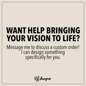 May include: A square image with a beige background and black text. The text reads: "WANT HELP BRINGING YOUR VISION TO LIFE?" followed by "Message me to discuss a custom order! I can design something specifically for you." The bottom right corner has the text "KBT designs".