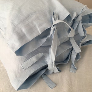 Juego de 2 fundas de almohada de lino azul claro con lazos, funda de almohada con lazo