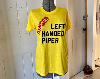 1980s Single Stitch Tee Shirt Danger Left Handed Piper Iron On Letters Bagpiper Size XL
