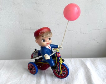 1960s - 1970s Tin MTU Wind up Boy on Tricycle with Balloon Toy