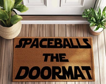 Spaceballs dörrmatta - Ett roligt tillskott för filmälskare! Djärv välkomstmatta perfekt för hemmabio, fläktgrotta eller filmkvällsdekoration!