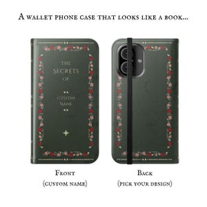 May include: A green phone case with a wallet flap. The front of the case has a vintage book design with the text "The Secrets Of" and a space for a custom name. The back of the case has a similar design with a black strap.