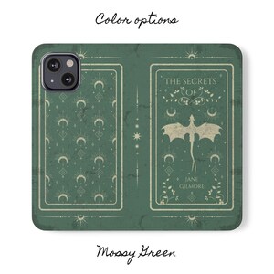 May include: A mossy green phone case with a white design featuring a dragon and the text "The Secrets of Jane Gilmore".