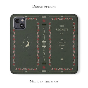 May include: A green phone case with a vintage book design. The case features a gold border with pink and red roses, a crescent moon, and the text "The Secrets of Custom Name". The bottom of the case reads "Magic in the Stars".