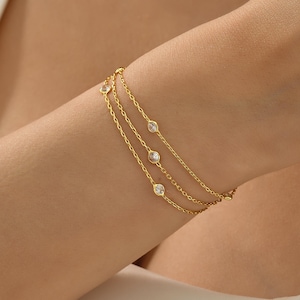 Pulsera de capas de plata de ley: cadena de circonitas bañada en oro