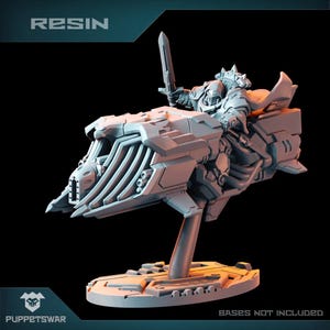 May include: A grey resin model of a futuristic spaceship with a rider holding a sword. The spaceship has a long, pointed nose and a large, open cockpit. The rider is wearing a helmet and armour. The model is on a circular base. The text "RESIN" is in the top left corner of the image. The text "BASES NOT INCLUDED" is in the bottom right corner of the image.