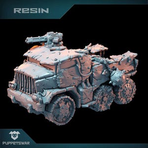 May include: A gray resin model of a heavily armored vehicle with a machine gun turret. The vehicle has six wheels, a rugged, textured exterior, and the word "RESIN" is printed at the top. The logo for "PUPPETSWAR" is at the bottom.