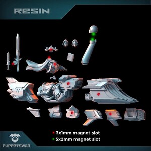 May include: A set of white resin model pieces for a spaceship, with red and green magnets for assembly. The pieces include a main body, wings, a cockpit, and a weapon.