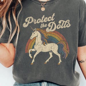 Protect the Dolls Shirt, Trans Rights T-Shirt, LGBTQ Pride Unicorn Tee, Pedro Pascal Inspired Queer Protest Shirt Anti-Trump Democrat Gift image 2