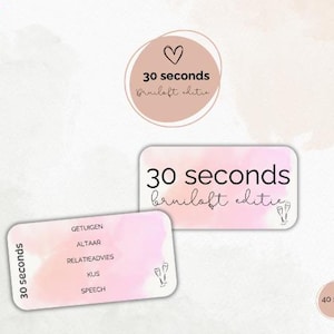 Puede incluir: Tarjetas con el texto "30 seconds bruiloft editie" en un diseño de acuarela rosa y blanco. Las tarjetas incluyen palabras como "GETUIGEN" y "ALTAAR". Un pequeño círculo indica "40 stuks".