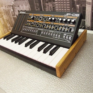 Roland Boutique K25M Keyboard Solid European Oak End Cheeks from Synths And Wood
