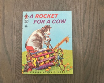A rocket for a Cow by Louise Lawrence Devine illustrated by Irma Wilde