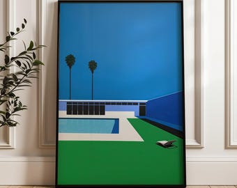 May include: Framed art print featuring a modernist architectural scene. The artwork depicts a swimming pool, a building with a flat roof, two palm trees, and a lounge chair on a green lawn, all under a bright blue sky. The print is in a black frame.