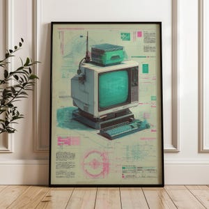 Peut inclure: Impression encadrée d'un ordinateur rétro avec un écran vert, un clavier et un boîtier vert séparé. Le fond présente des schémas techniques en bleu, rose et vert. L'impression est dans un cadre noir.