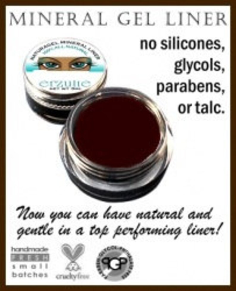May include: A small jar of dark brown mineral gel eyeliner. The label says "Mineral Gel Liner" and "erzulie". The text also says "no silicones, glycols, parabens, or talc." and "Now you can have natural and gentle in a top performing liner!"