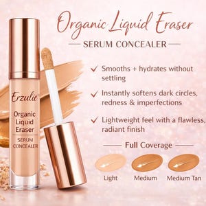 Op de afbeelding: Afbeelding van de "Organic Liquid Eraser Serum Concealer" cosmetica. De transparante fles heeft een ros&eacute;gouden dop. De afbeelding bevat tekst die de voordelen van het product en kleurstalen beschrijft. Het belooft volledige dekking.