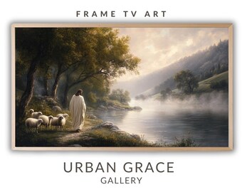 May include: A painting depicting a man in white robes walking along a path by a river with sheep following him. The scene is set in a lush green valley with a misty background. The painting is titled "Urban Grace Gallery".