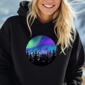 Northern Lights Hoodie Aurora Borealis Shirt Winter Hiking Hoodie Nature Lover Gift Outdoor Adventure Shirt Forest Graphic Tee Space Themed