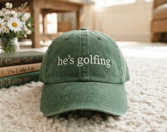 Embroidered He's Golfing Hat, Sarcastic Golf Cap, Golf Gifts for Him, Trendy Dad Hat, Golf Accessories, Funny Dad Hat, Funny Golf Cap