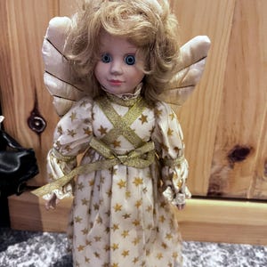 Mistique-(Haunted doll) positive witch
