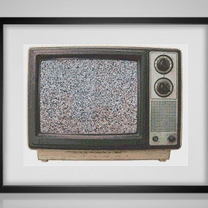 May include: A vintage television set with a static screen. The television is beige with a black screen and black knobs.