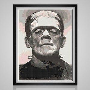 May include: Black and white close-up portrait of Frankenstein's monster. The monster has a serious expression and is looking directly at the viewer.