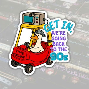 May include: A sticker featuring a cartoon duck driving a red car labeled "TIME MACHINE." The duck wears a colander hat and a microwave is mounted on top. Text reads "GET IN! WE'RE GOING BACK TO THE 90s."